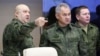 Сергей Суровикин (слева) и Сергей Шойгу (в центре), 16 декабря 2022 года