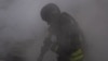 Ukraine -- Rescue workers fighting fire in Sumy region after a Russian strike, 15May2025 